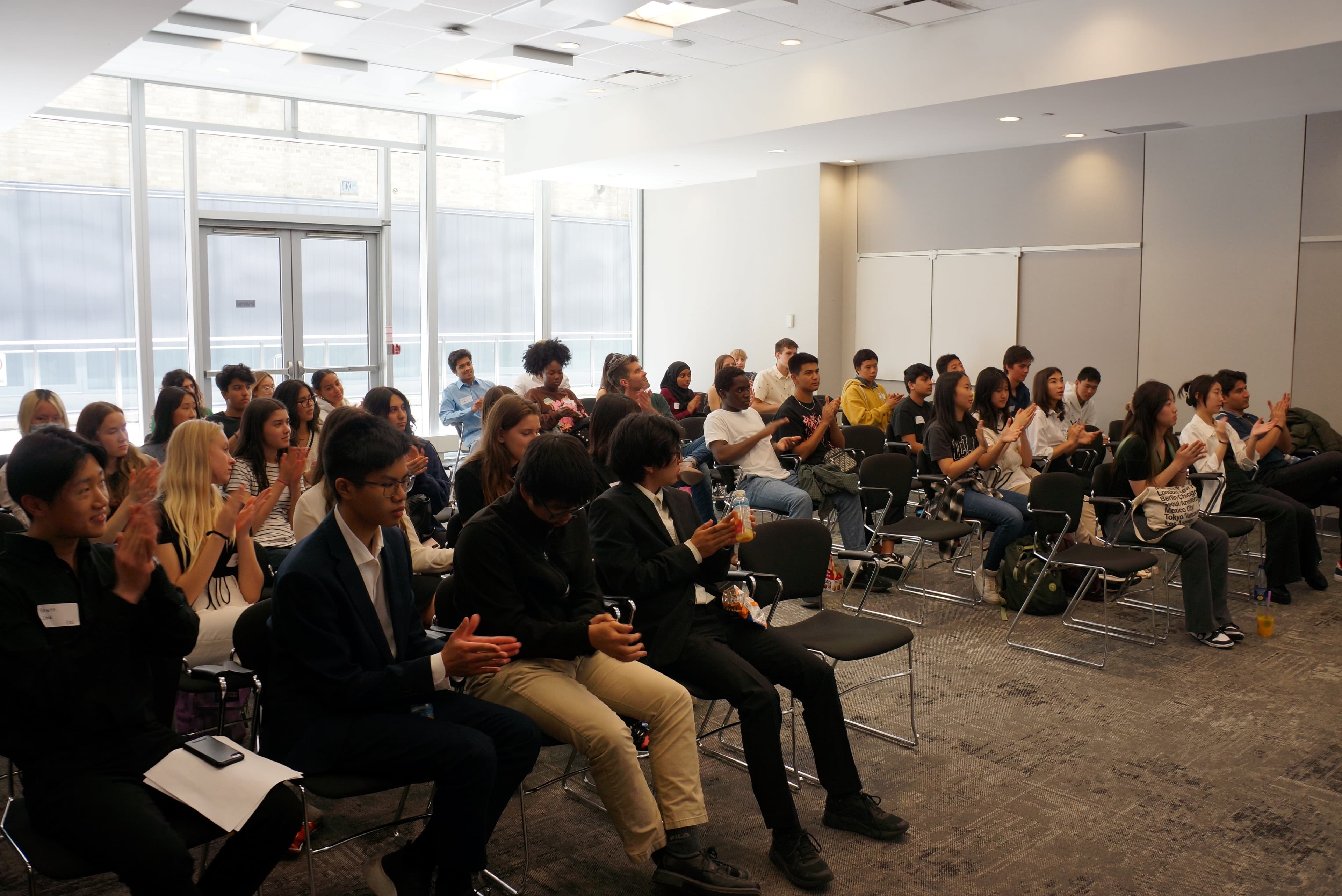 Attendees seated at a TYSIC session
